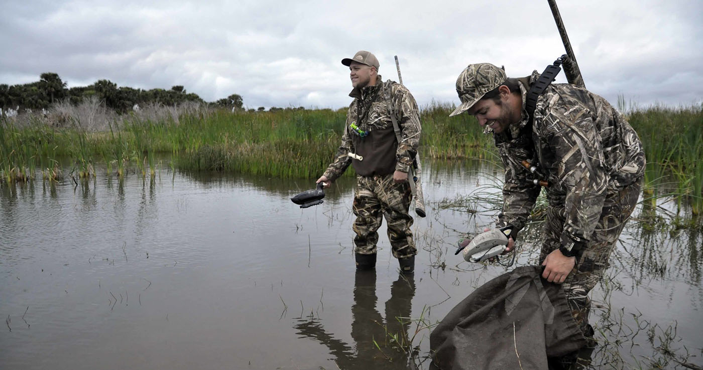 Photo of hunters throwing out decoys during the Tennessee duck season.